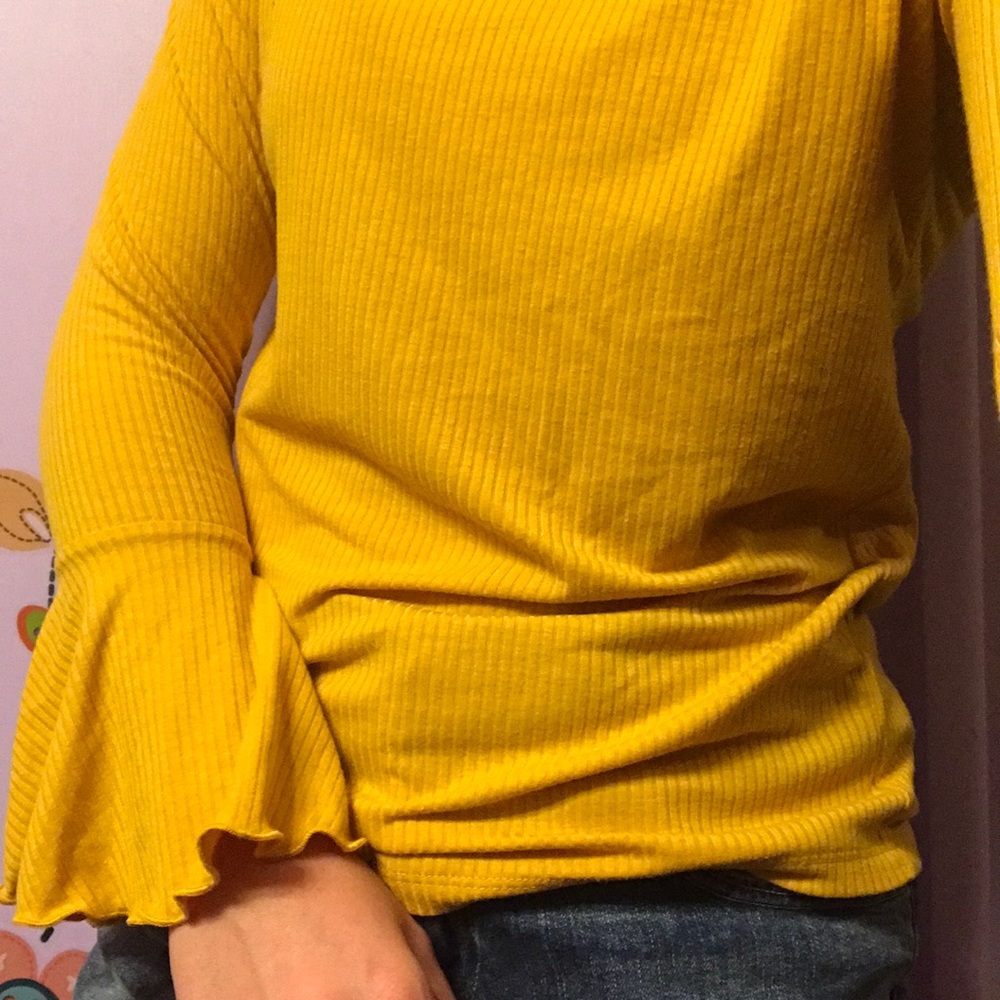 a yellow shirt